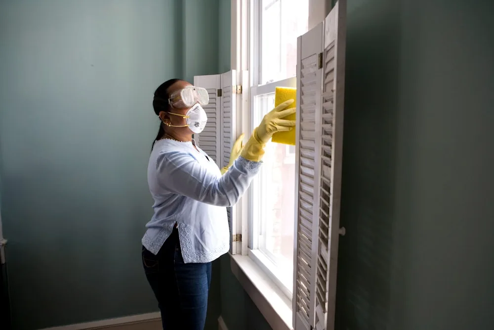 Certified technician repairing modern refrigerator